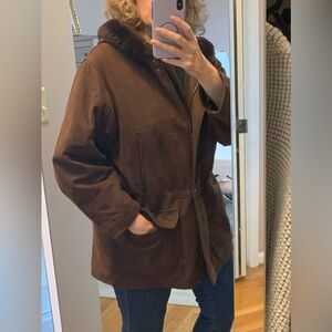 Coach, like new lines warm jacket. Hand crafted and numbered.  Size Large.